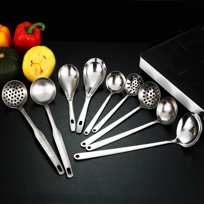 LadleLux stainless steel soup ladle on kitchen counter | Colander-style ladle scooping vegetables from soup | LadleLux utensil straining pasta from boiling water | Shiny stainless steel ladle with ergonomic handle | LadleLux ladle resting on cooking pot edge | Kitchen ladle with built-in strainer holes | Durable stainless steel soup ladle and colander combo | LadleLux being used to serve broth from saucepan | Close-up of slotted ladle straining hot soup | Elegant soup ladle with strainer for multi-purpose u