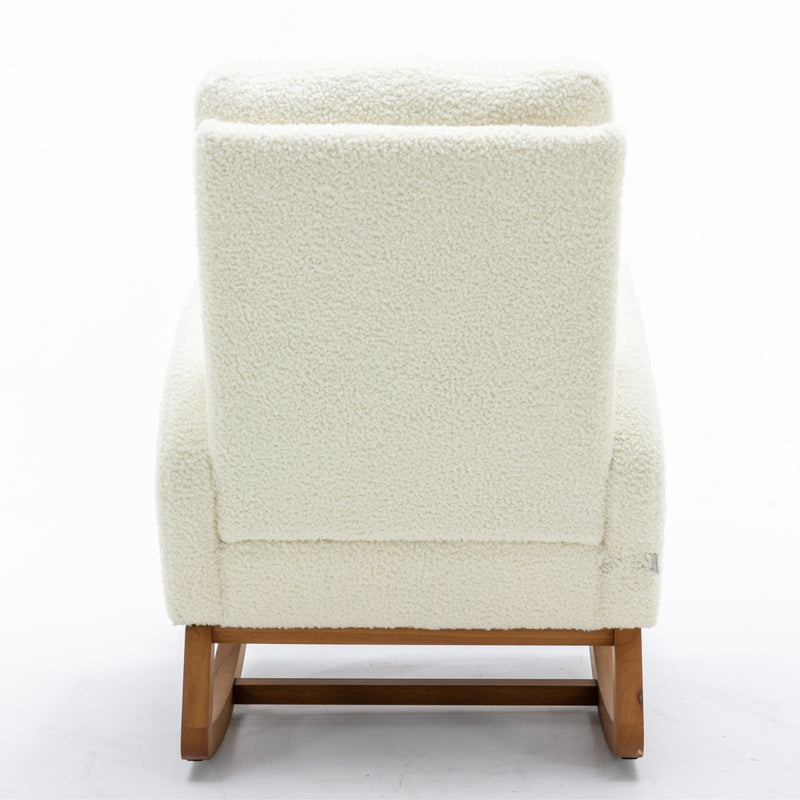 CoolRock modern rocking chair in living room | Comfortable padded rocking chair beside window | Stylish glider chair with wooden base | Cozy rocking chair for reading corner | Minimalist rocker with soft upholstery | CoolRock chair next to floor lamp and side table | Modern rocking chair for nursery or lounge | Ergonomic cushioned rocker in neutral tone | Elegant living room chair with gentle glide | CoolRock lounge chair in cozy interior setup

