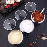 FlavorVault stainless steel seasoning pot with lid | Kitchen spice container holding salt and pepper | FlavorVault used to store herbs and spices | Compact stainless steel spice jar on countertop | Seasoning pot with airtight lid for freshness | FlavorVault spice pot with modern kitchen design | Sleek stainless steel container for kitchen spices | FlavorVault holding ground pepper and curry powder | Durable spice storage pot with easy-grip lid | FlavorVault seasoning pot beside cooking utensils


