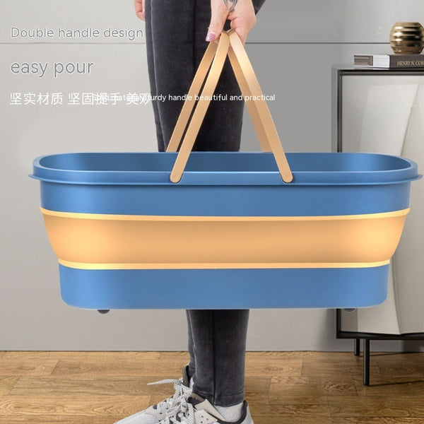 MopMate double-handle mop bucket on tile floor | Household cleaning bucket with sturdy dual grips | MopMate used for mopping kitchen floor | Spacious mop bucket with water and mop inside | Durable plastic mop bucket with two handles | MopMate bucket beside microfiber mop | Leak-proof cleaning bucket in utility room | Multi-use mop bucket for household chores | Ergonomic mop bucket for easy carrying | Compact cleaning bucket with stable base