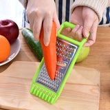 KitchenSwift manual chopper and grater on kitchen counter | Stainless steel blades chopping vegetables in KitchenSwift | KitchenSwift slicing carrots with multi-blade insert | Manual kitchen grater with anti-slip base | Multifunctional chopper dicing onions and garlic | Compact grater and slicer with stainless steel design | KitchenSwift prepping salad ingredients on cutting board | Handheld food chopper with safety handle and blade guard