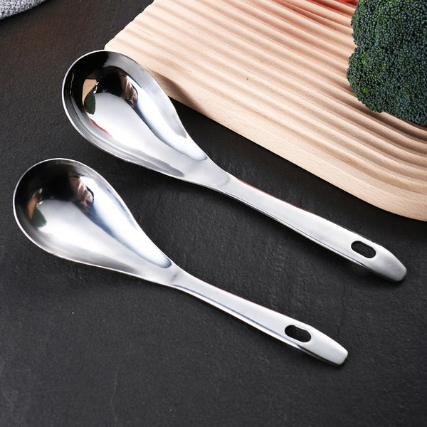 LadleLux stainless steel soup ladle on kitchen counter | Colander-style ladle scooping vegetables from soup | LadleLux utensil straining pasta from boiling water | Shiny stainless steel ladle with ergonomic handle | LadleLux ladle resting on cooking pot edge | Kitchen ladle with built-in strainer holes | Durable stainless steel soup ladle and colander combo | LadleLux being used to serve broth from saucepan | Close-up of slotted ladle straining hot soup | Elegant soup ladle with strainer for multi-purpose u