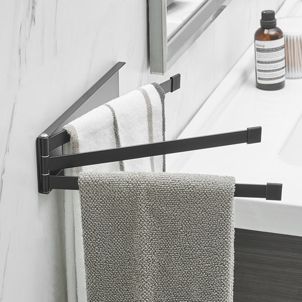NordRack towel rack mounted on bathroom wall | Minimalist non-drill towel rack in Nordic style | Adhesive towel rack holding white towel | Nordic-style rack for towels and accessories | Wall-mounted towel holder without drilling | Compact towel rack in modern bathroom | Rust-resistant adhesive towel rack | NordRack above sink in small bathroom

