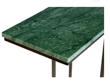 MarbleC One side table with marble top | 24-inch accent table with metal frame | Modern marble coffee table in living room | Round marble top table beside a sofa | Minimalist end table with white marble surface | Contemporary metal frame marble table | MarbleC One table styled in a modern home | Elegant marble side table with black frame | Compact living room table with stone finish | Stylish marble top table in small space decor