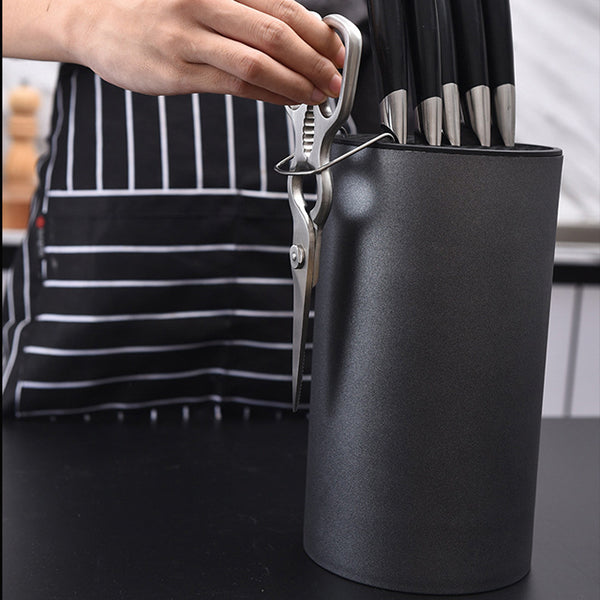 KnifeNest kitchen rack holding knives and utensils | Multifunctional knife and utensil organizer on countertop | Compact knife rack with storage for kitchen tools | KnifeNest shelf with stainless steel knives displayed | Modern kitchen utensil holder and knife stand combo | Space-saving knife organizer in contemporary kitchen | KnifeNest mounted on kitchen wall with tools stored | Durable kitchen rack holding cutlery and cooking tools | KnifeNest with wooden finish and knife slots | Safe knife storage rack 