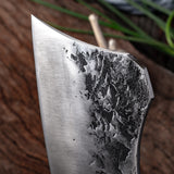 BladeCraft stainless steel chef knife on wooden cutting board | Sharp kitchen knife slicing vegetables with precision | Ergonomic chef knife with full-tang handle | BladeCraft knife cutting raw meat on butcher block | Stainless steel kitchen knife with sleek, modern design | High-performance BladeCraft knife in home kitchen | Chef holding BladeCraft knife while chopping herbs | Close-up of BladeCraft blade edge and handle grip | Professional-grade knife resting on chef apron | Versatile kitchen knife ideal 