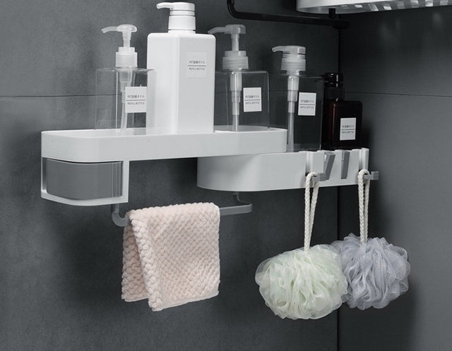 ShelfMate bathroom shelf mounted on tiled wall | Multifunctional shelf holding shampoo and soap | Waterproof bathroom organizer with hooks | ShelfMate above sink with toiletries arranged | Modern rust-resistant bathroom storage shelf | Compact shelf for small bathroom essentials | Wall-mounted shelf with toothbrush holder | Minimalist ShelfMate rack in bathroom setting | Adhesive bathroom shelf with built-in hooks | ShelfMate organizing toiletries in modern bathroom

