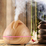 ConchBreeze diffuser releasing essential oil mist | Shell-shaped aroma diffuser with LED light | Conch diffuser on wooden nightstand | Coastal-style ultrasonic diffuser for home use | Essential oil diffuser with seashell design | Compact conch aroma diffuser in modern room | ConchBreeze diffuser glowing with soft light | Aromatherapy diffuser shaped like a conch shell | Stylish shell diffuser for home relaxation | Ultrasonic conch diffuser with calming mist effect