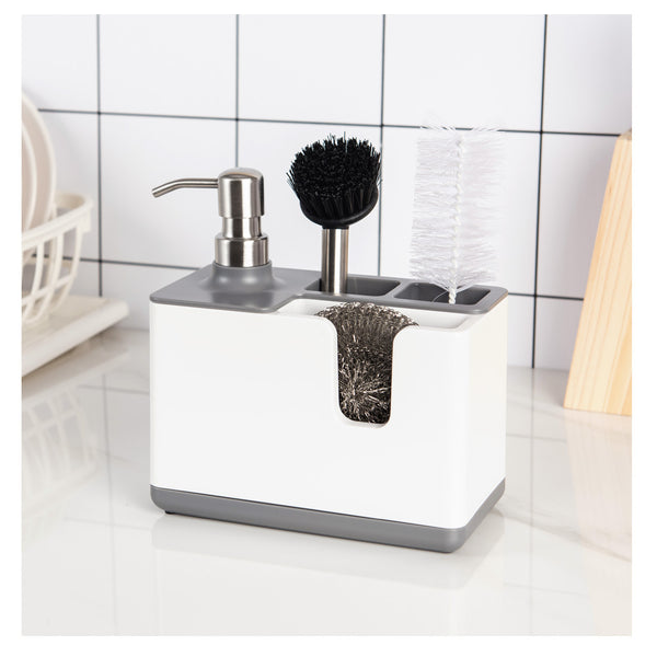 SoapMate soap dispenser with utensil holder on kitchen sink | 2-in-1 soap dispenser and sponge storage organizer | SoapMate with scrub brush and sponge neatly stored | Kitchen sink organizer with built-in soap pump | Durable soap dispenser with cleaning tool holder | Compact kitchen soap dispenser and brush caddy | SoapMate keeping sink area tidy and organized | Non-slip base soap dispenser with utensil storage

