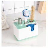 SoapMate soap dispenser with utensil holder on kitchen sink | 2-in-1 soap dispenser and sponge storage organizer | SoapMate with scrub brush and sponge neatly stored | Kitchen sink organizer with built-in soap pump | Durable soap dispenser with cleaning tool holder | Compact kitchen soap dispenser and brush caddy | SoapMate keeping sink area tidy and organized | Non-slip base soap dispenser with utensil storage


