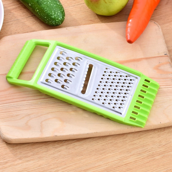KitchenSwift manual chopper and grater on kitchen counter | Stainless steel blades chopping vegetables in KitchenSwift | KitchenSwift slicing carrots with multi-blade insert | Manual kitchen grater with anti-slip base | Multifunctional chopper dicing onions and garlic | Compact grater and slicer with stainless steel design | KitchenSwift prepping salad ingredients on cutting board | Handheld food chopper with safety handle and blade guard