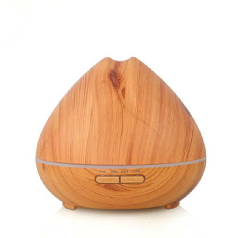 ConchBreeze diffuser releasing essential oil mist | Shell-shaped aroma diffuser with LED light | Conch diffuser on wooden nightstand | Coastal-style ultrasonic diffuser for home use | Essential oil diffuser with seashell design | Compact conch aroma diffuser in modern room | ConchBreeze diffuser glowing with soft light | Aromatherapy diffuser shaped like a conch shell | Stylish shell diffuser for home relaxation | Ultrasonic conch diffuser with calming mist effect