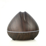ConchBreeze diffuser releasing essential oil mist | Shell-shaped aroma diffuser with LED light | Conch diffuser on wooden nightstand | Coastal-style ultrasonic diffuser for home use | Essential oil diffuser with seashell design | Compact conch aroma diffuser in modern room | ConchBreeze diffuser glowing with soft light | Aromatherapy diffuser shaped like a conch shell | Stylish shell diffuser for home relaxation | Ultrasonic conch diffuser with calming mist effect