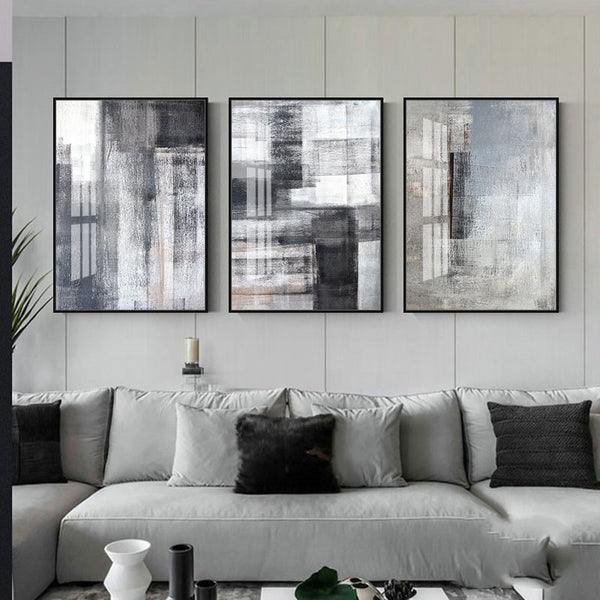 WallMuse painting hanging in modern living room | Abstract wall art above a neutral sofa | Contemporary framed artwork in stylish interior | Living room wall décor with elegant canvas print | Large decorative painting on white wall